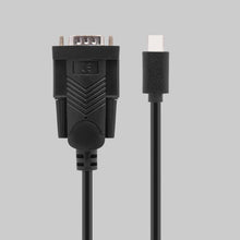 Sort Plexgear USB-C til seriel adapter med VGA-stik til venstre og USB-C til højre, egnet til RS-232 udstyr.