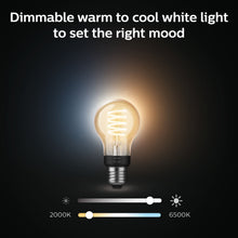 Philips Hue Filament A60 E27 Smart LED-pære 550 lm, varm gul til venstre, kold hvid til højre, dæmpbar slider vises.
