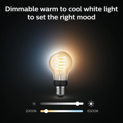 Philips Hue Filament A60 E27 Smart LED-pære 550 lm, varm gul til venstre, kold hvid til højre, dæmpbar slider vises.