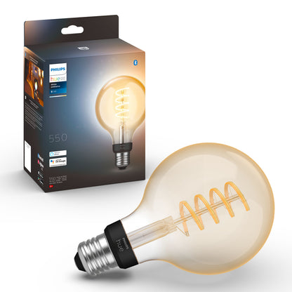 Philips Hue Filament G93 E27 Smart LED-pære 550 lm foran æske med Bluetooth og smart home symboler.