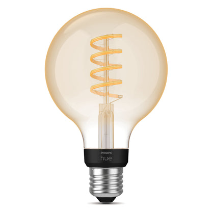 Philips Hue Filament G93 E27 LED 550 lm med synlig gul spiral, klart glas, sølv sokkel og sort Philips Hue-bånd.