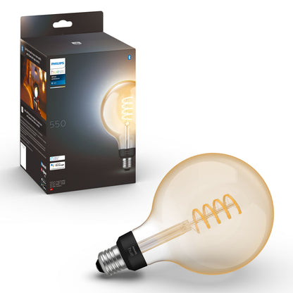 Philips Hue Filament G125 E27 Smart LED-pære 550 lm spiral synlig foran æske med produktoplysninger.