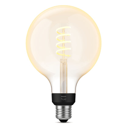 Philips Hue Filament G125 E27 Smart LED-pære 550 lm klar rund pære synlig spiralfilament sort sokkel varm gul glød.