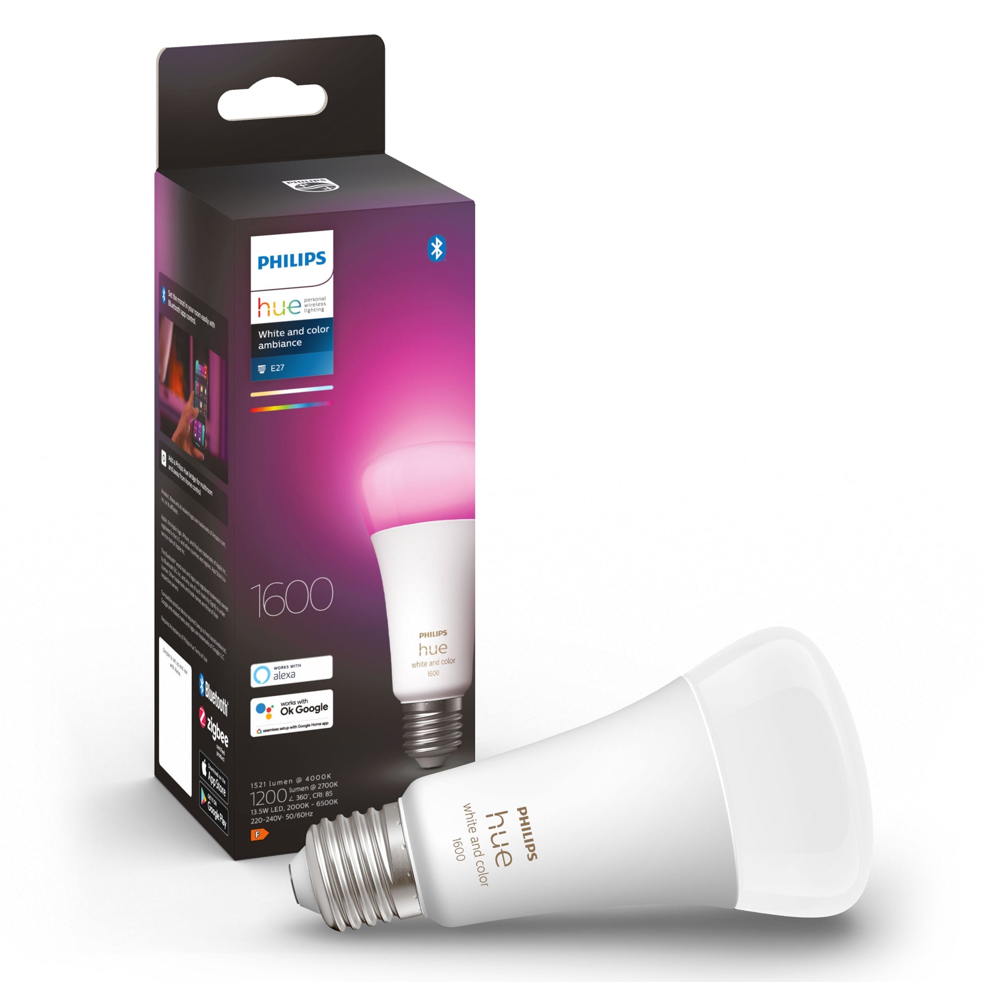 Philips Hue Color Ambiance Smart LED-pære E27 1600 lm med emballage, Philips Hue-logo, Bluetooth og stemmeassistent ikon.