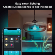 Philips Hue Color Ambiance Smart LED-pære E27 1600 lm vist i app på smartphone.