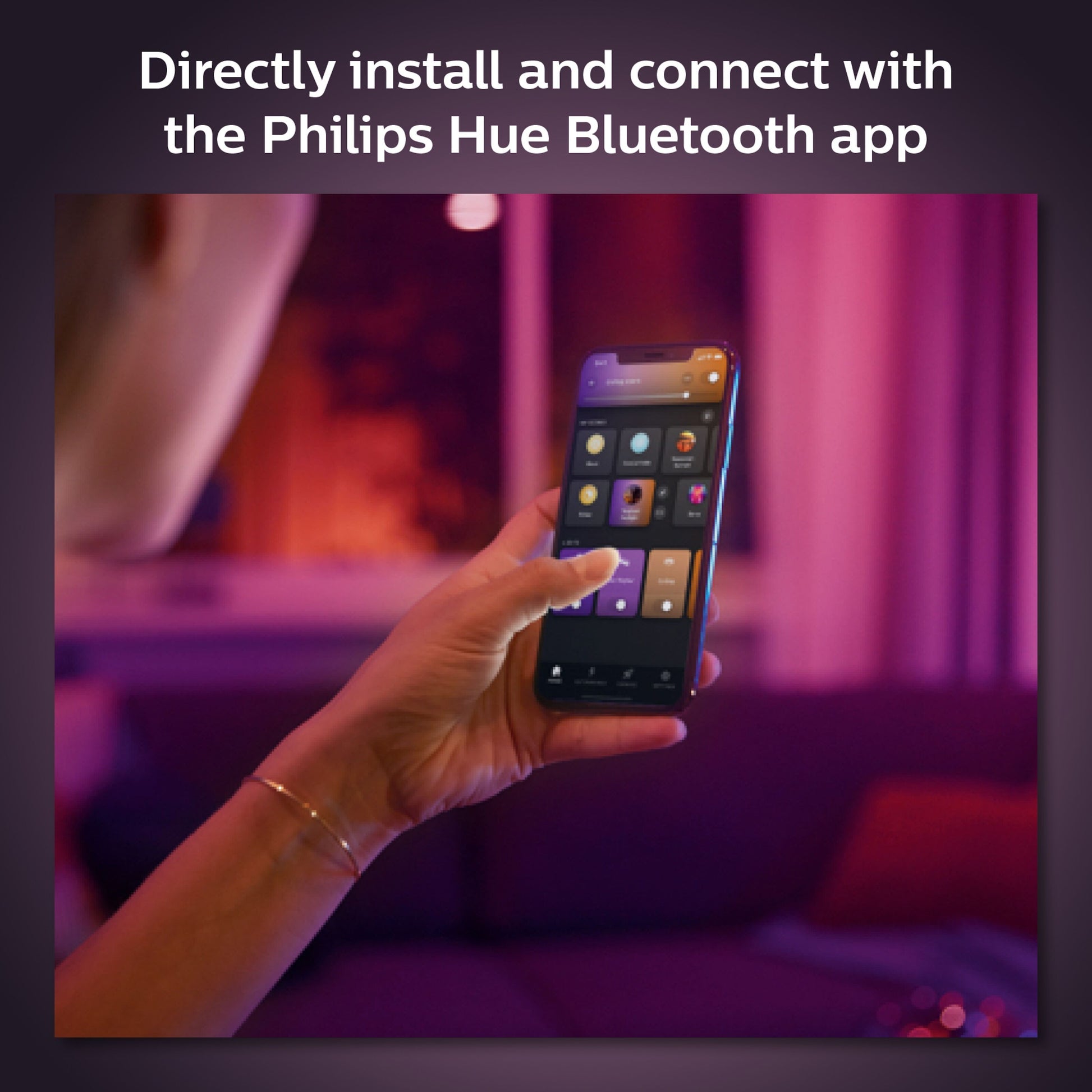 Philips Hue Color Ambiance Smart LED-pære E27 1600 lm vist i Philips Hue-appens lysindstillinger på smartphone.