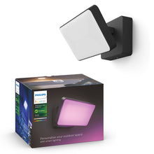 Philips Hue Opdag Udendørs projektør 2250 lm, lyser pink, vises over original æske.