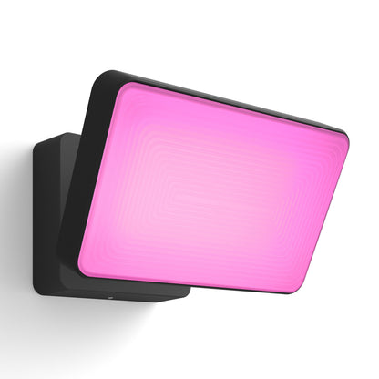 Philips Hue Opdag Udendørs projektør 2250 lm sort, lyser blødt pink, kompakt firkantet design.