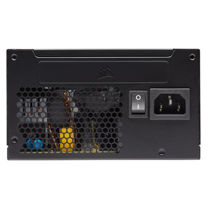 Corsair CX750 750W Bronze strømforsyning med on/off-knap, trebenet strømstik og honeycomb-gitter viser interne dele.