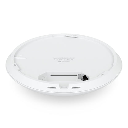 Ubiquiti Unifi U7 Pro Wifi 7 adgangspunkt, hvid, rund med forsænket Ethernet-port og detaljeret label under bunden.