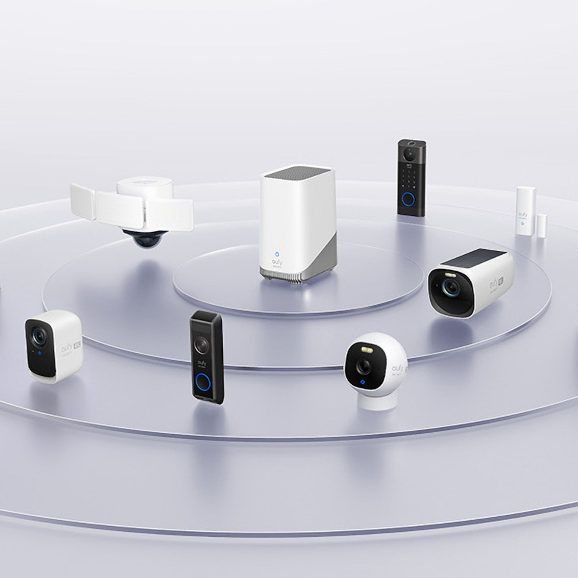 Eufy S380 HomeBase 3 16 GB hjemmesikkerhedssystem med lokal lagring, flere modeller vist ovenfra på spejlende overflade.