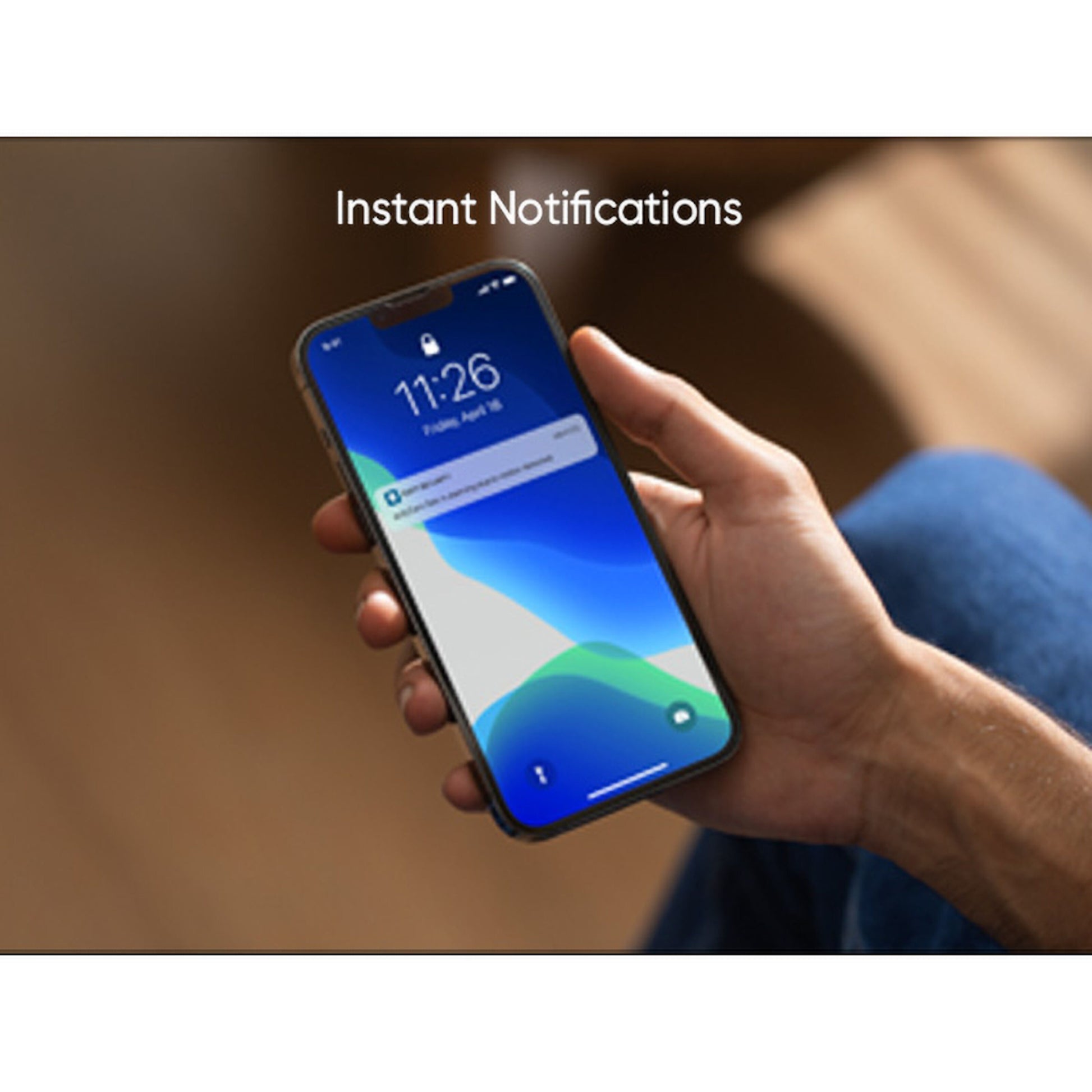 Eufy Indendørs kamera C220 Trådløs overvågningskamera 2K vises via smartphone-låseskærm med notifikation kl. 11:26.