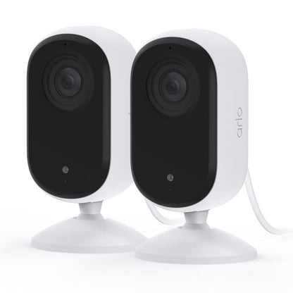 Arlo Essential 2K indendørskamera 2-pakke, hvid/sort, runde kanter, bevægelsesregistrering, Arlo-logo synligt.