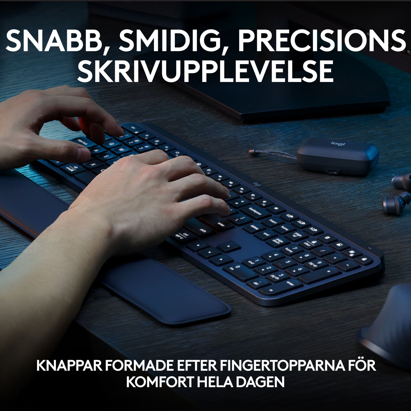 Logitech MX Keys S trådløst tastatur grafit med håndledsstøtte, bagbelyste taster, svensk layout synlig på taster.