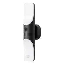 Eufy Væglampe med kamera S100, sort/hvid vertikal design, centreret linse, vægmonteret kamera.