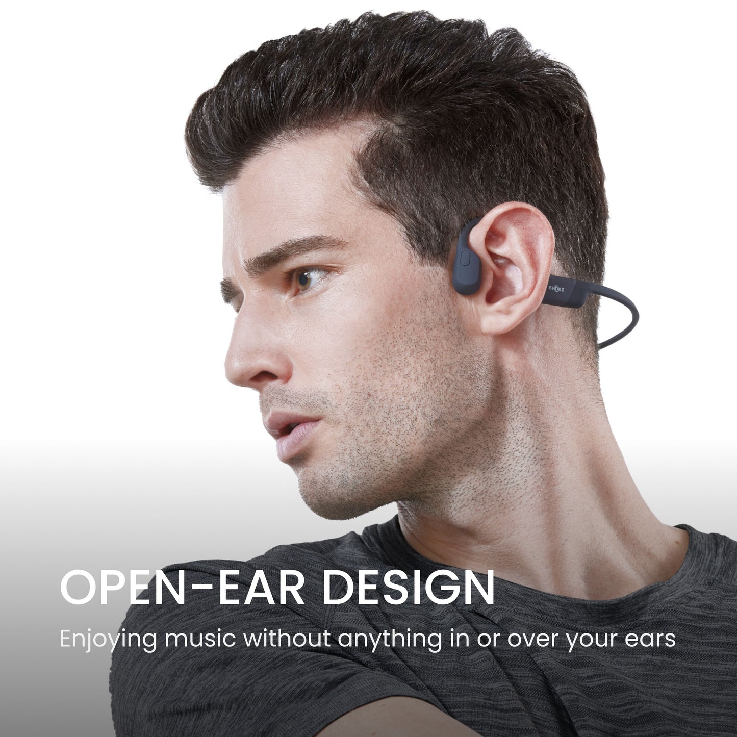 Shokz OpenRun trådløse hovedtelefoner USB-C, open-ear design, hviler på kindben, ører frie, tekst: ÅBENT-ØRE-DESIGN.