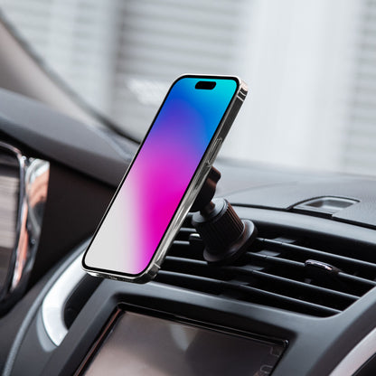 Smartphone med gradient-skærm i magnetisk mobilholder til bil på luftblæser, synlige dele af instrumentbræt og AC-knapper.