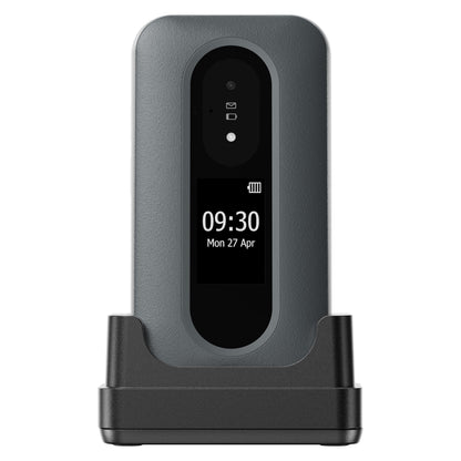 Doro Leva L31 mobiltelefon 4G sort/hvid i oplader, viser tid 09:30, dato 27 Apr på skærm med batteri- og notifikationsikoner.