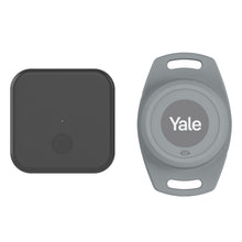 Yale Smart åbner til motoriserede garageporte og rund grå Yale nøglebrik, kompatibel med Yale Home app.