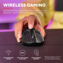 Trust Helox GXT929 Trådløs Sort gamingmus i hånd, 4 GHz trådløs, 800-4800 DPI, overlay WIRELESS GAMING, op til 80 timers batteri.
