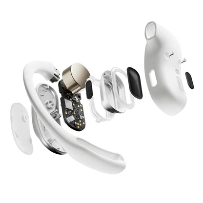 Shokz OpenFit Air trådløse hovedtelefoner hvid, open-ear design vist med synlige indre dele som kredsløb, højttaler og batteri.