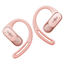 Shokz OpenFit Air trådløse open-ear hovedtelefoner med ørekroge i lyserød.