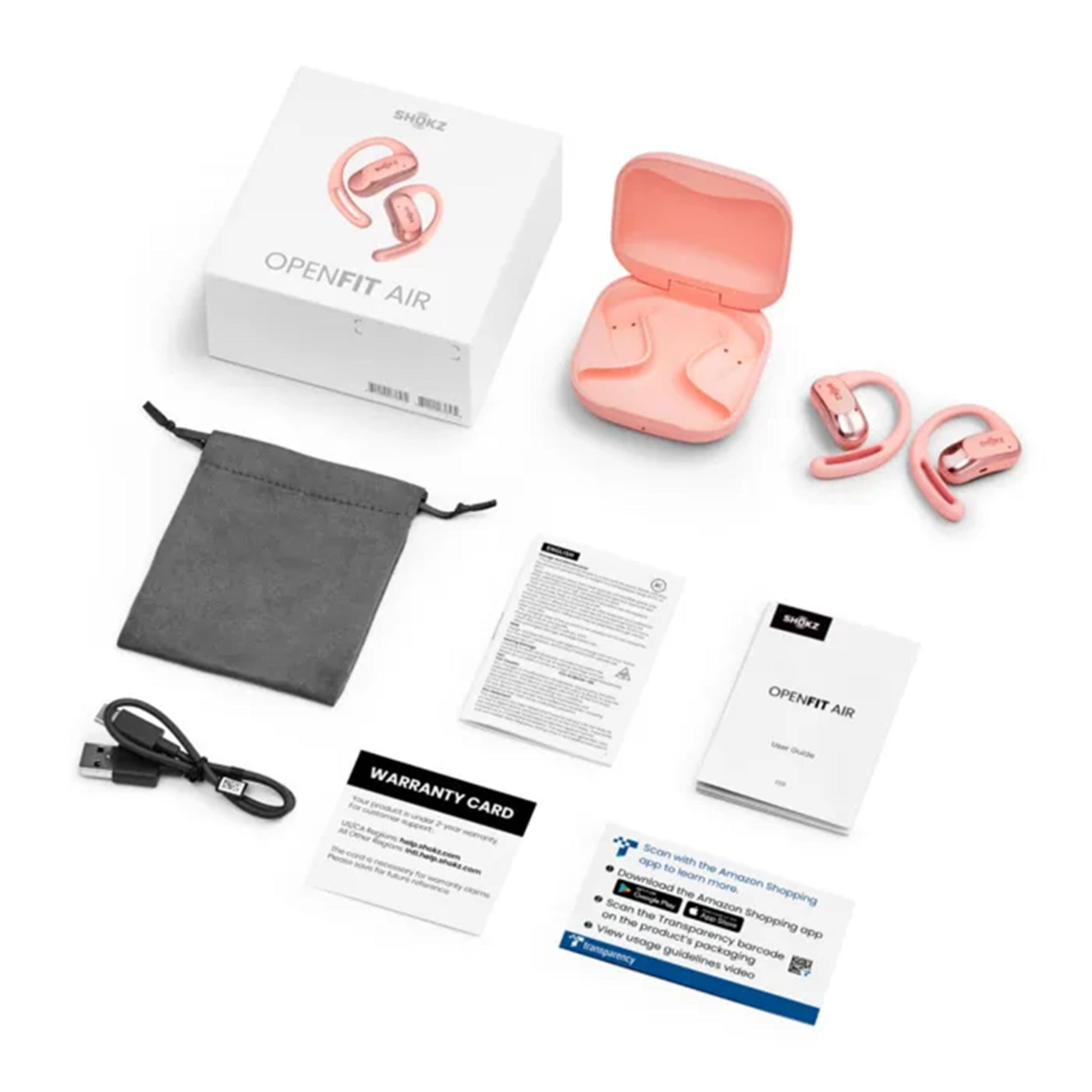 Shokz OpenFit Air trådløse hovedtelefoner lyserød med opladeetui, USB-kabel, sort pose, manualer og produktæske.