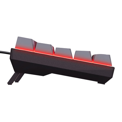 Trust Acira GXT867 tastatur 60, side, hævede røde belyste taster, kantet base, synlig tilsluttet kabel.