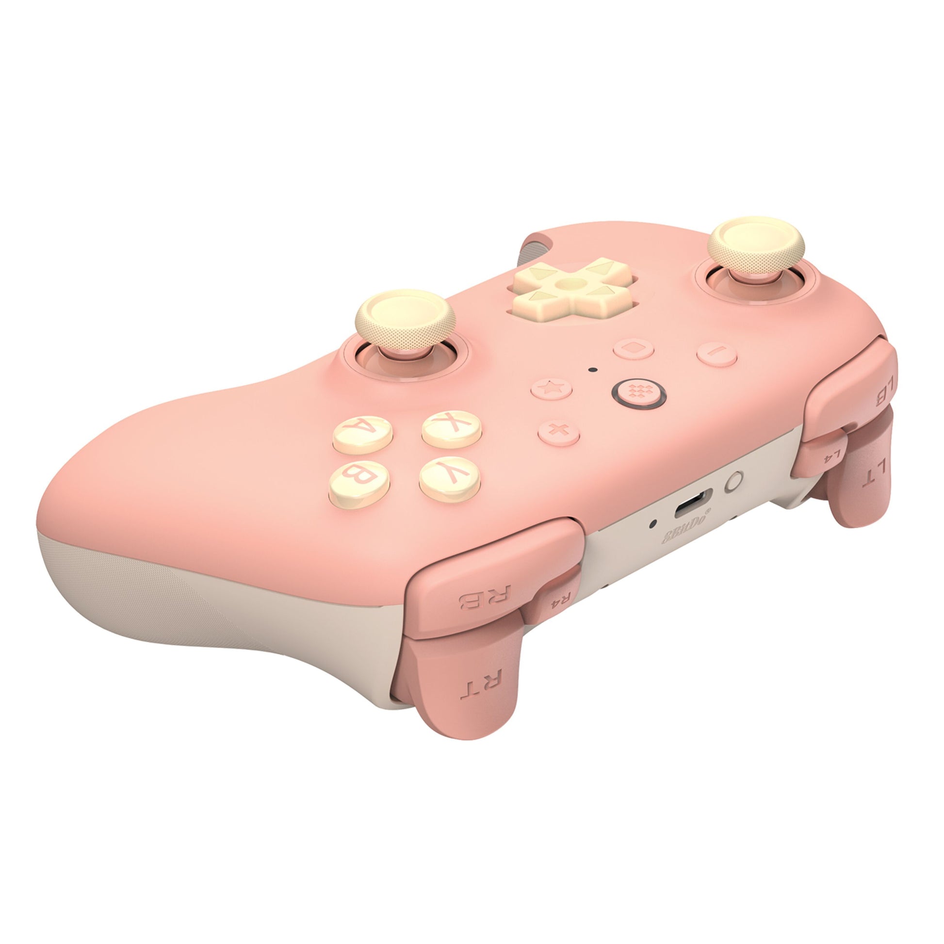 8Bitdo Ultimate 2C trådløs controller til Switch, Fersken, pastel lyserød/creme, gule joysticks/knapper, USB-port synlig.