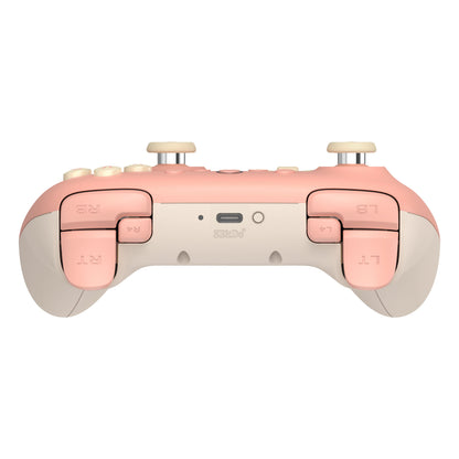 8Bitdo Ultimate 2C trådløs controller med Hall Effect, fersken, to joysticks, fire knapper, skulderknapper, top-view.