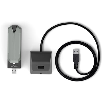 TP-Link TBE400UH gråt USB netværkskort WiFi 7, aftagelig hætte, dockingstation med USB-port og sort USB-kabel.