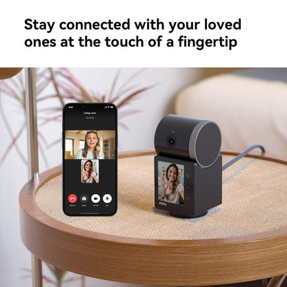 Imou Rex VT Pro 5 MP Trådløs indendørskamera ved siden af smartphone med videoopkald, Imou-logo synligt.