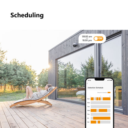 Imou Krydstogt 2C 5MP trådløst overvågningskamera monteret udendørs, smartphone viser scheduling-funktion.