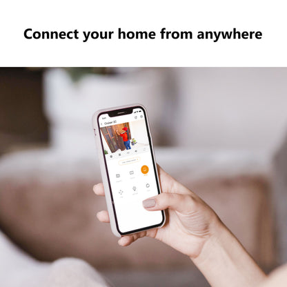 Imou Krydstogt 2C 5 MP trådløst overvågningskamera app vises på smartphone med "Connect your home from anywhere" tekst.