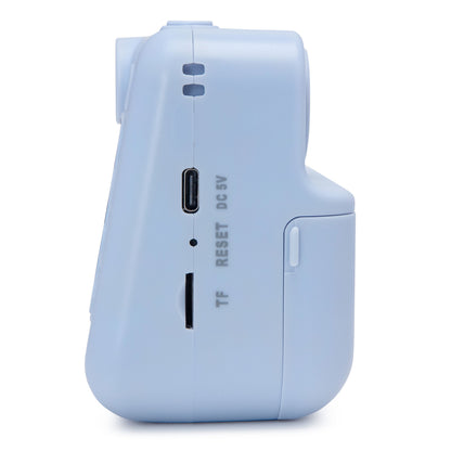 Luxorparts Instant kamera til børn blå fra siden med USB-C port, TF-microSD kortslot og resetknap.