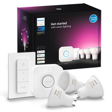 Philips Hue White and Color Ambiance 3x GU10 Smart Startpakke med tre pærer, trådløs dæmperkontakt og smart hub foran æske.