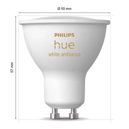 Philips Hue Hvid Ambiance Smart LED-pære GU10 400 lm, 57 mm høj, 50 mm i diameter, guld logo og model på siden.