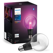 Philips Hue RGB G95 Smart LED-pære E27 500 lm lyser lilla foran æske med Bluetooth, stemmestyring og smart assistant.