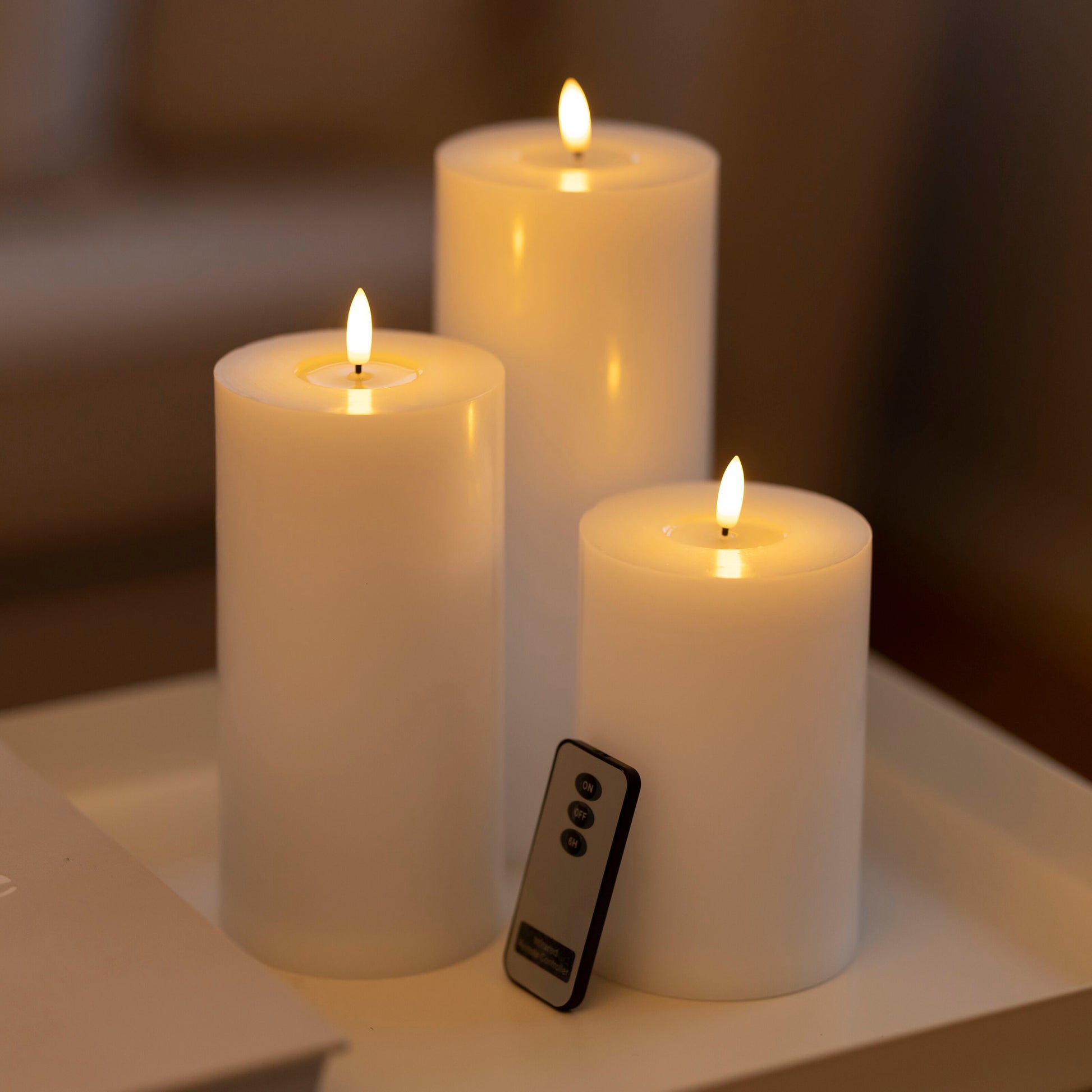 LED Bloklys 3-pak, tre højder med varmt lys, fjernbetjening foran mindste lys.