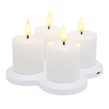 LED varmelys genopladelige 4-pak med flammeeffekt på hvid kløverformet base.