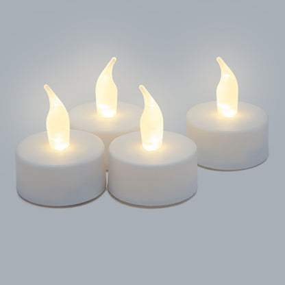 Fire LED fyrfadslys 4-pak med gul-hvid glød, hvid base.