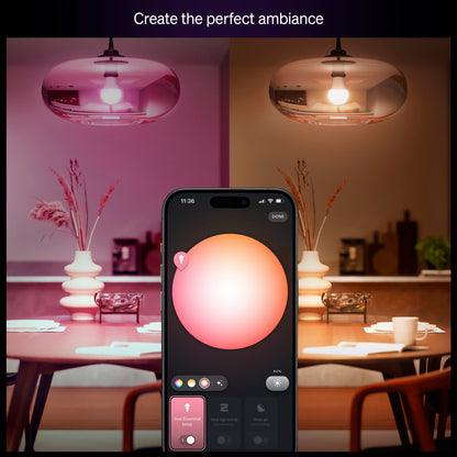 Philips Hue Essentiel Smart LED-pære E27 806 lm viser varmt rosa lys i den ene side og neutralt hvid i den anden via app.