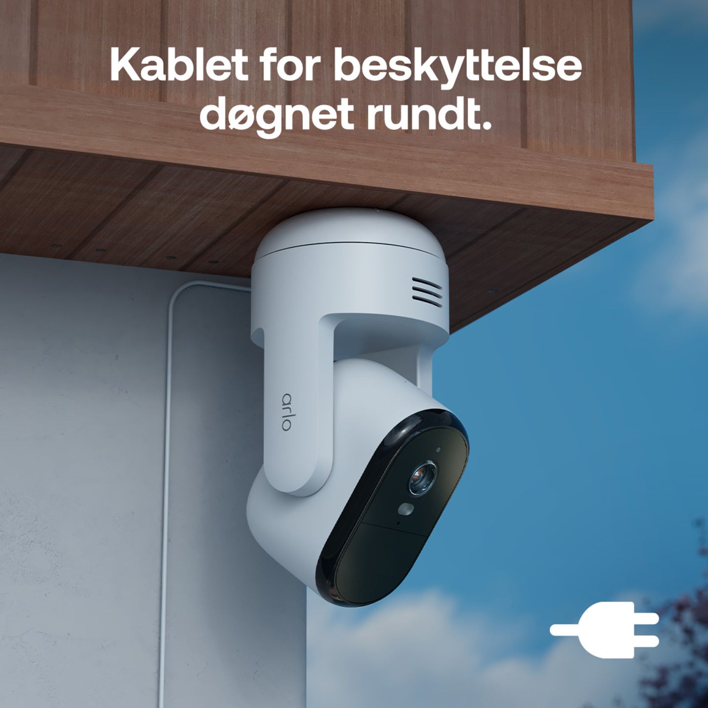 Arlo Essential 3 HD PTZ trådløst overvågningskamera 2-pak under trætagkant, tekst: Kablet til beskyttelse døgnet rundt.