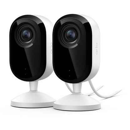 Arlo Essential 3 2K overvågningskamera indendørs 2-pak, sorte frontpaneler, vidvinkellinser, runde baser, hvidt strømkabel.