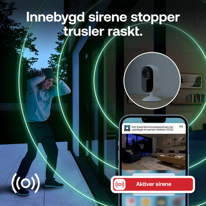 Arlo Essential 3 2K overvågningskamera indendørs 2-pak, smartphone med advarsel, tekst: Innebygd sirene stopper trusler.