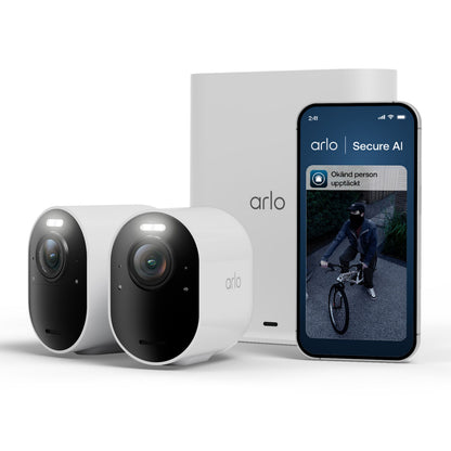 Arlo Ultra 3 4K trådløst overvågningskamera 2-pak med basestation, smartphone viser sikkerhedsadvarsel og billede.