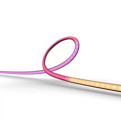 Philips Hue Play Gradient Lightstrip til TV 75" i lyserøde, lilla, orange og gule farvegradienter.