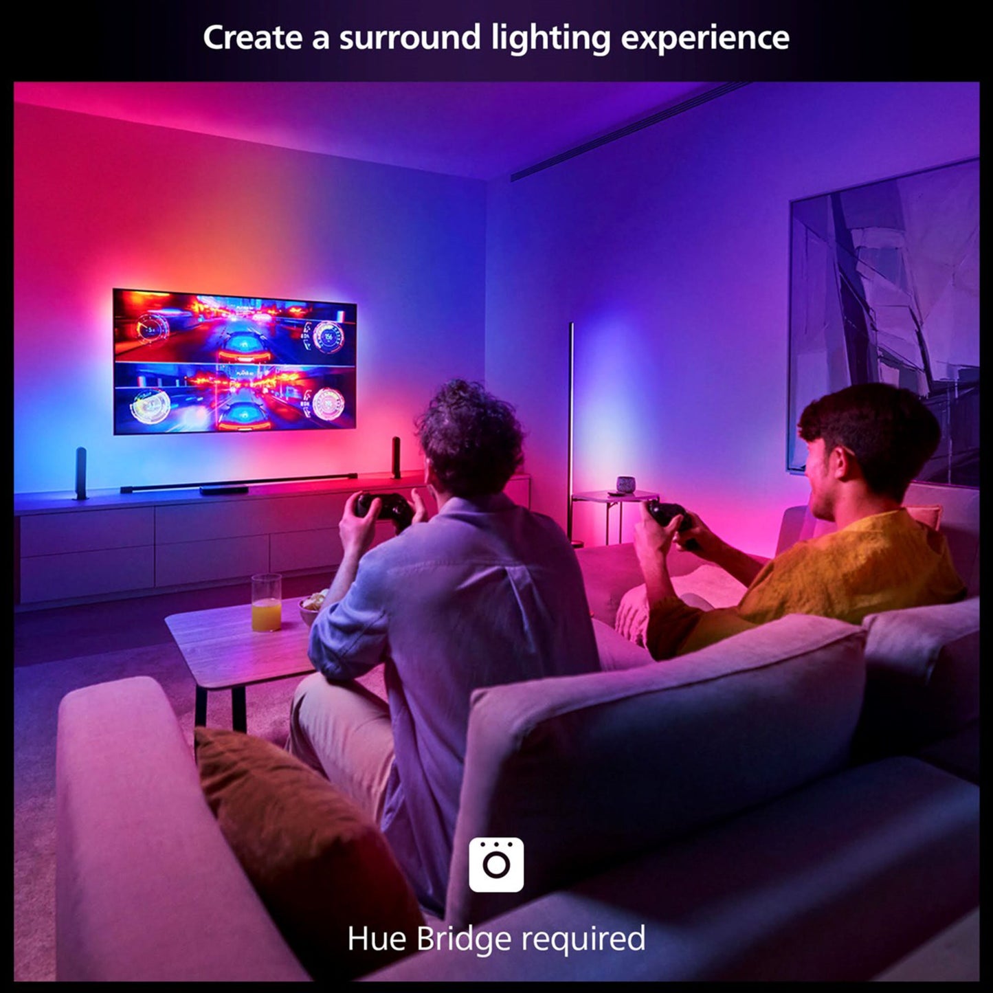 Philips Hue Play HDMI Sync Box 8K Gen 2 sort, synkroniserer farvet belysning med TV, tekst: Skab en surround-belysningsoplevelse.