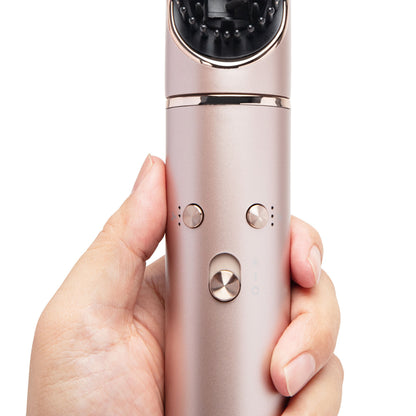 High-speed Multistyler 7-i-1 hårtørrer i rosaguld med BLDC-motor, kontrolknapper og børstehoved med små massageknopper.