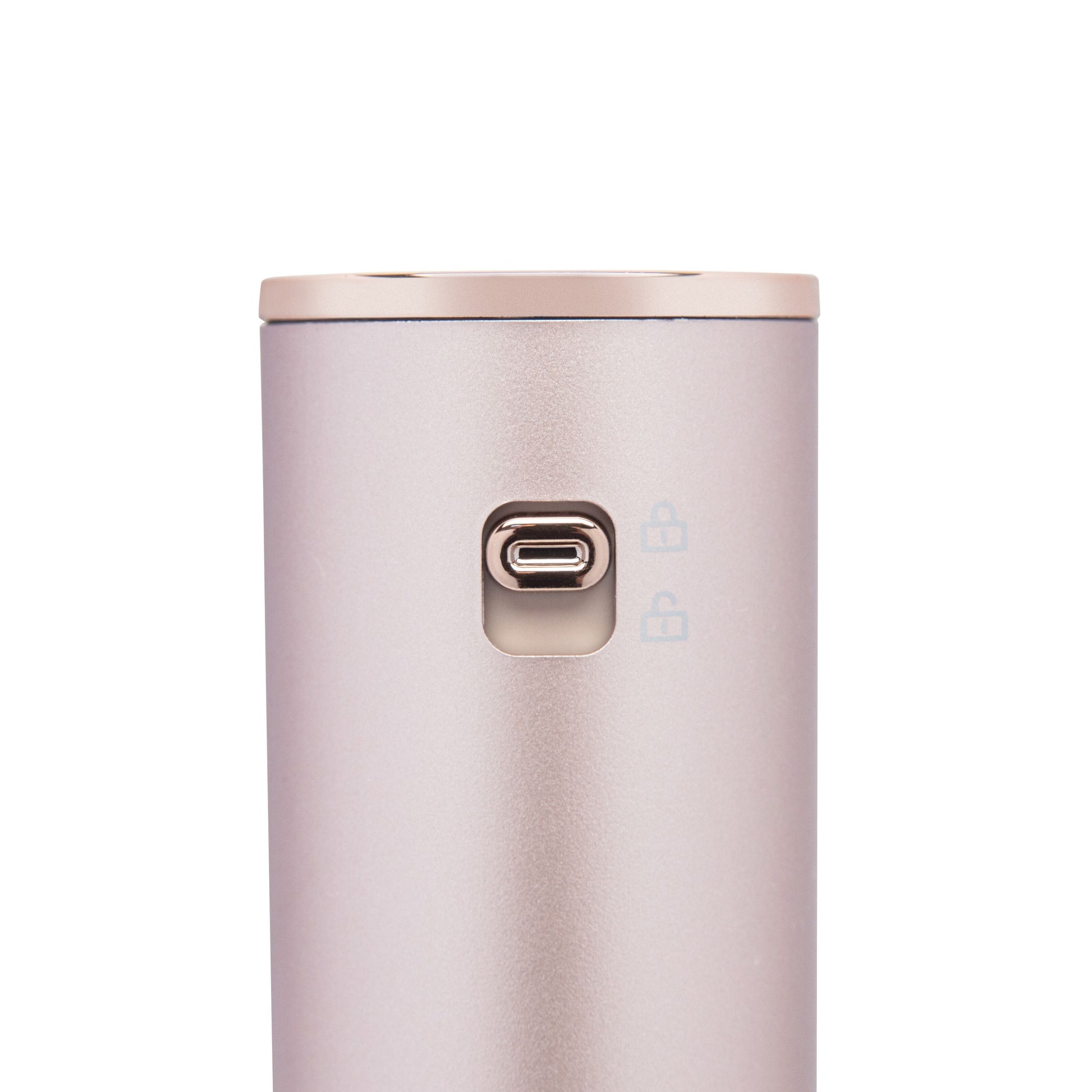 High-speed Multistyler 7-i-1 hårtørrer, metallic rosaguld, cylinder, USB-C port, til små låseikoner på overfladen.